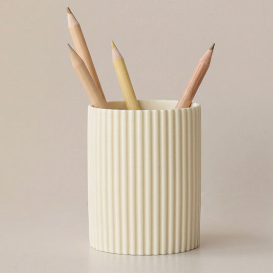 Cream cylindrical pen holder with fine vertical ribbing