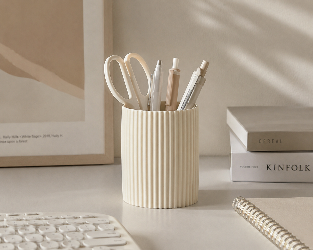 Cream cylindrical pen holder with fine vertical ribbing